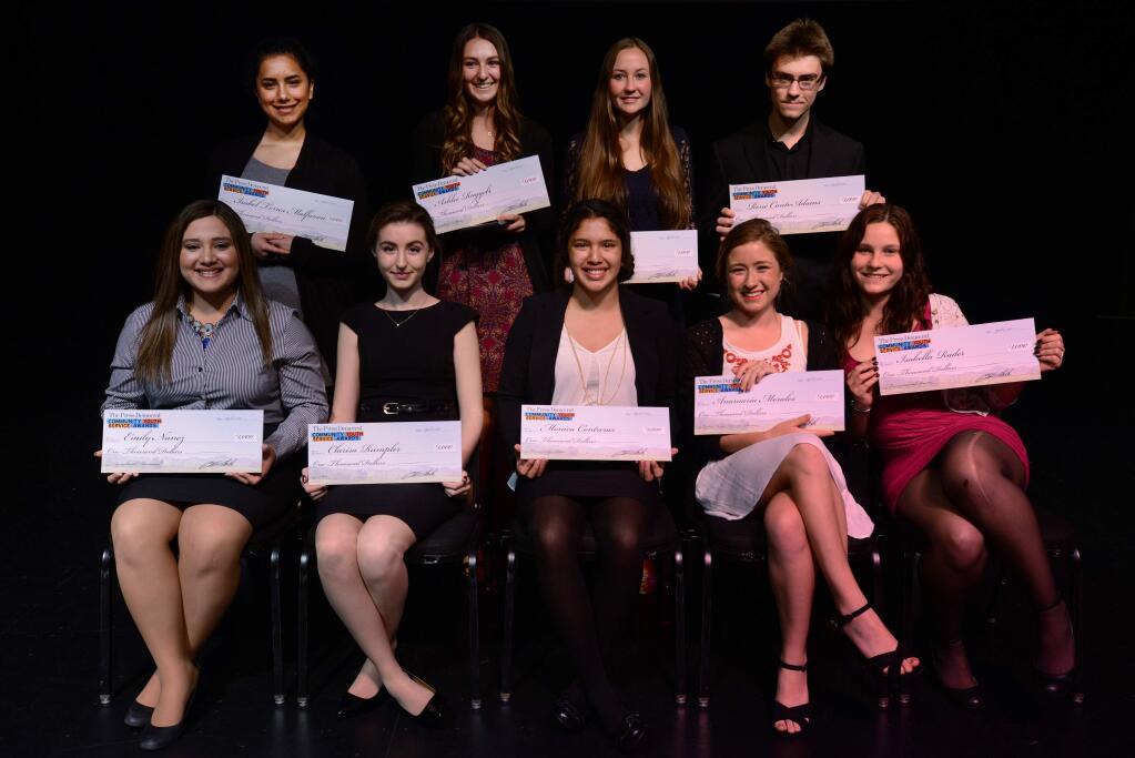 The Press Democrat Community Youth Service Awards winners with their $1000 dollar checks at the Luther Burbank Center for the Arts in Santa Rosa, (bottom row from left) Emily Nunez of Healdsburg, Clarisa Rumpler of Healdsburg , Monica Contreras of Windsor, Anamaria Morales of El Molino and Isabella Rader of Windsor, (top row from left) Isabel Torres Malfavon of Windsor, Ashlee Ruggels of Santa Rosa, Julia Hasson of Cardinal Newman and RenÃ© CantoAdams of Windsor. Edden Yashar, not pictured, of Petaluma also won but was not able to make the event. April 11, 2016. (Photo: Erik Castro/for The Press Democrat)