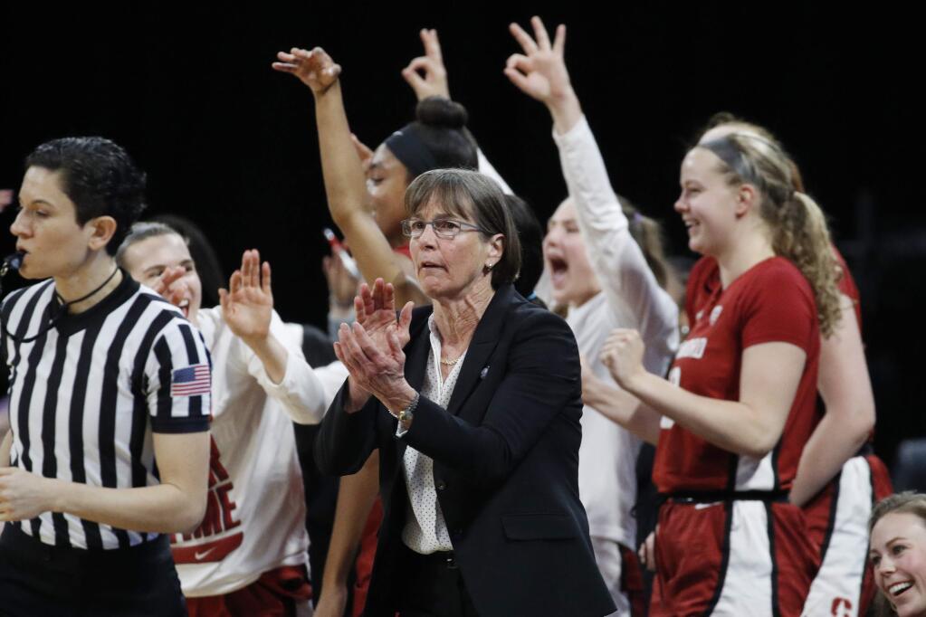 Stanford head coach Tara VanDerveer rects with her team during the second half against UCLA in the semifinal round of the Pac-12 women's tournament Saturday, March 7, 2020, in Las Vegas. (AP Photo/John Locher)