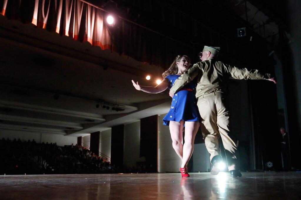 Dr. Greg Sacher, right, of Annadel Medical Group performs a swing dance number with professional dance partner Janelle Guido during Dancing with the Stars and Stripes, a benefit for the Veterans Resource Centers of America at the Veterans Memorial building in Petaluma, California, on Saturday, April 2, 2016. (Alvin Jornada / The Press Democrat)