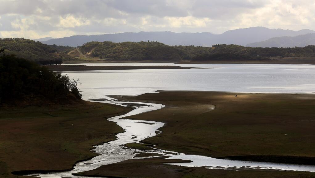 PHOTO: 3 BY KENT PORTER/ THE PRESS DEMOCRAT -LOW FLOWS: The east fork of the Russian River flows this week into the one-third full Lake Mendocino in Ukiah. PG&E plans to temporarily unplug its Potter Valley Powerhouse this winter, which would reduce the amount of water from the Eel River to the Russian and, ultimately, Lake Mendocino.