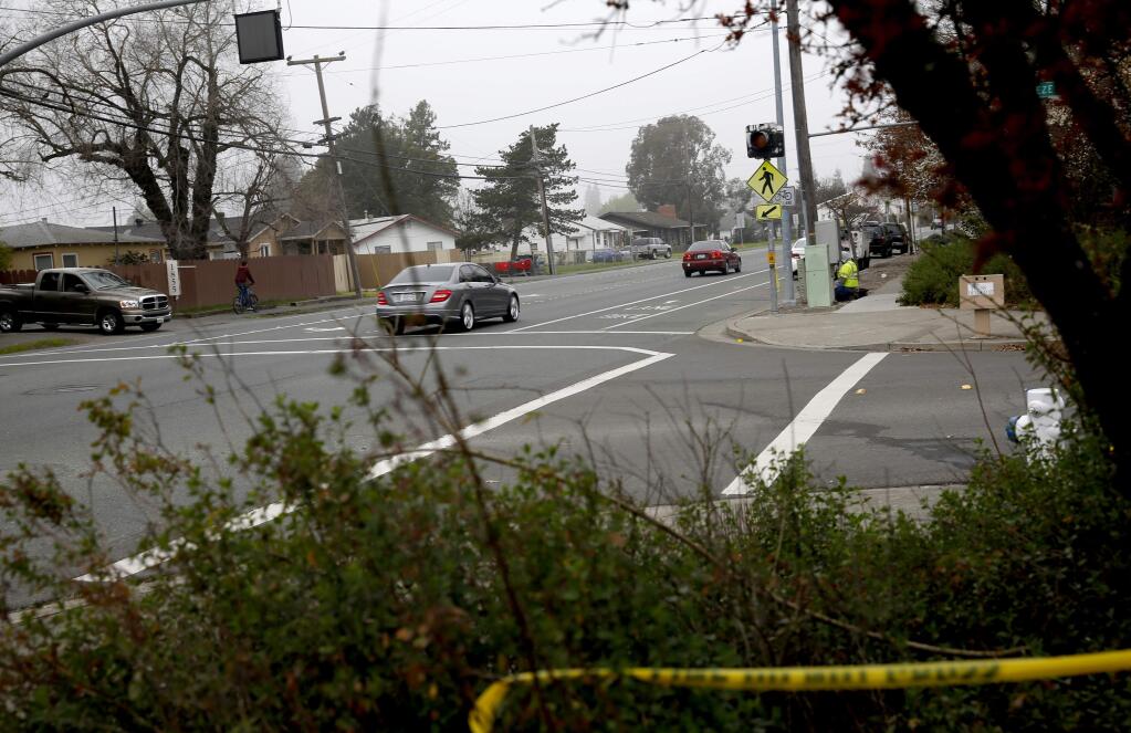 Vehicles pass through the crosswalk at Petaluma Hill Road and Breeze Way in Santa Rosa on Monday, March 9, 2015. (BETH SCHLANKER/ PD)