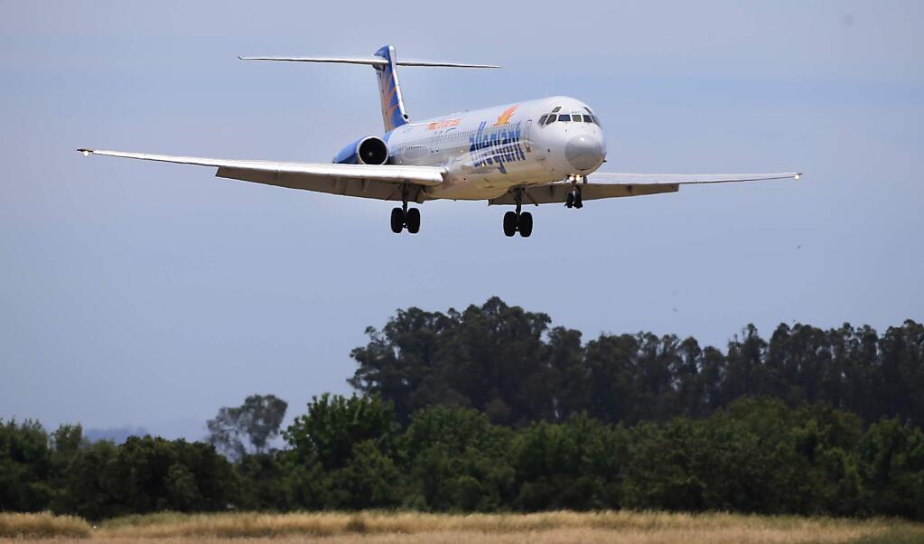 Allegiant Air prepares to touch down for the first time at the Charles M. Schulz-Sonoma County Airport in Santa Rosa, Thursday May 19, 2016 from Las Vegas. (Kent Porter / Press Democrat) 2016
