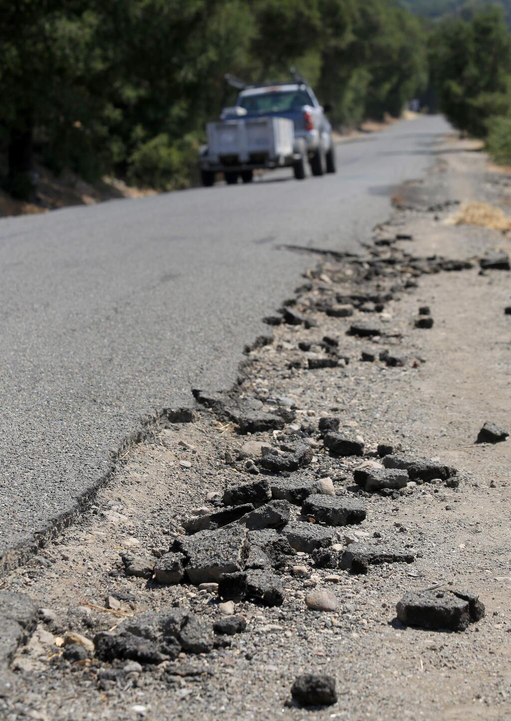 The edge of Faught Road south of Shiloh Regional Park is crumbling in numerous locations. The road, once a less used country road, is now heavily traveled and used as scenic alternative to Old Redwood Highway through Windsor. (Kent Porter / Press Democrat) 2014