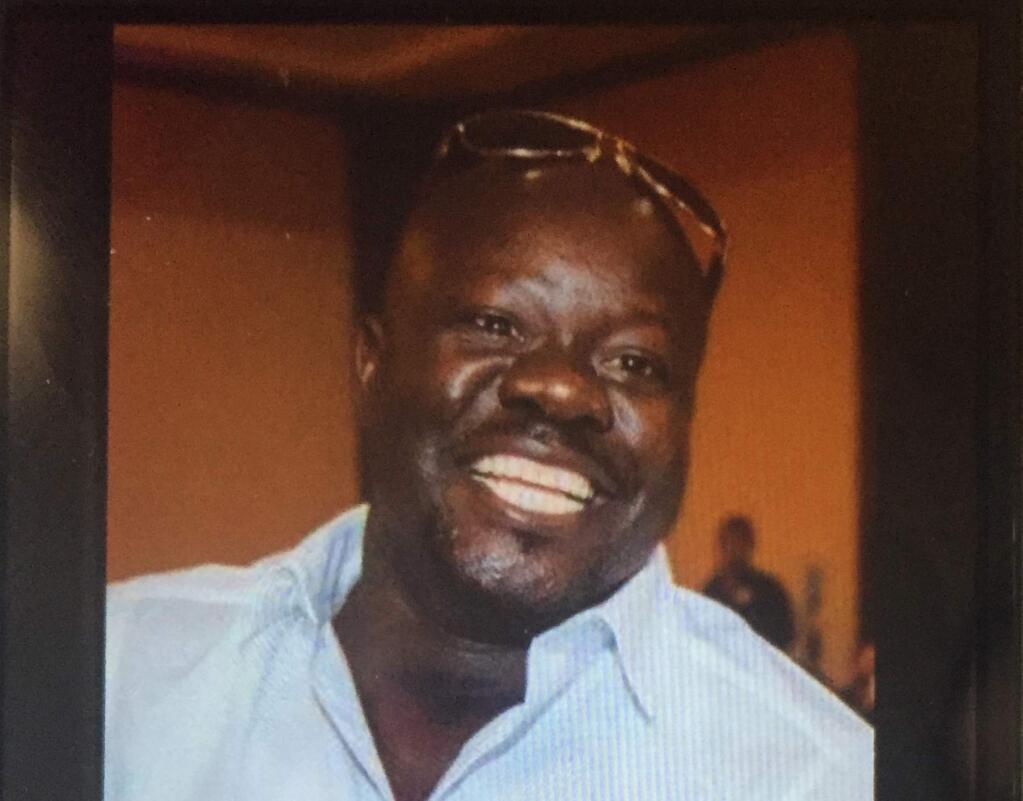 This undated cellphone photo released by Dan Gilleon, the attorney for the family of Alfred Olango, shows Alfred Olango, the Ugandan refugee killed Tuesday, Sept. 27, 2016, in El Cajon, Calif. The fatal police shooting of Olango, who drew something from his pocket and extended his hands in a 'shooting stance' happened about a minute after officers in a San Diego suburb arrived at the scene where a mentally unstable man was reportedly walking in traffic, a police spokesman said Wednesday. (Olango Family via AP)