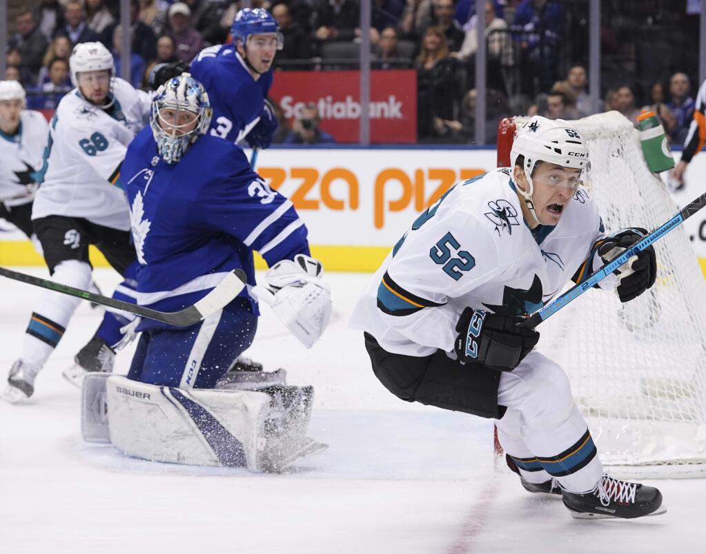 San Jose Sharks forward Lukas Radil reacts after missing a scoring chance against Toronto Maple Leafs goaltender Fredrik Andersen during the third period Friday, Oct. 25, 2019, in Toronto. (Hans Deryk/The Canadian Press via AP)