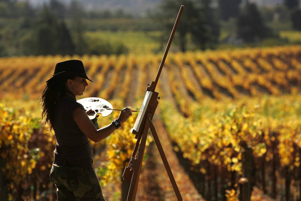 Our beautiful vineyards, especially when the fall colors take over. Here, artist Jayashri Triolo captures the colors of a fall vineyard in Sebastopol. (John Burgess/PD FILE)