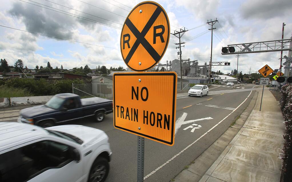 At Lakeville Street in Petaluma, signs have been posted to enforce a no train horn zone, Wednesday April 19, 2017 in Petaluma. The ban took effect on Wednesday, but SMART officials did not heed the ban and continued to sound the horn in Petaluma intersections. (Kent Porter / The Press Democrat) 2017