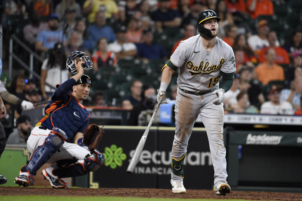 Oakland Athletics’ Seth Brown watches his two-run home run during the ninth inning of a baseball game against the Houston Astros, Sunday, Oct. 3, 2021, in Houston. (AP Photo/Eric Christian Smith)