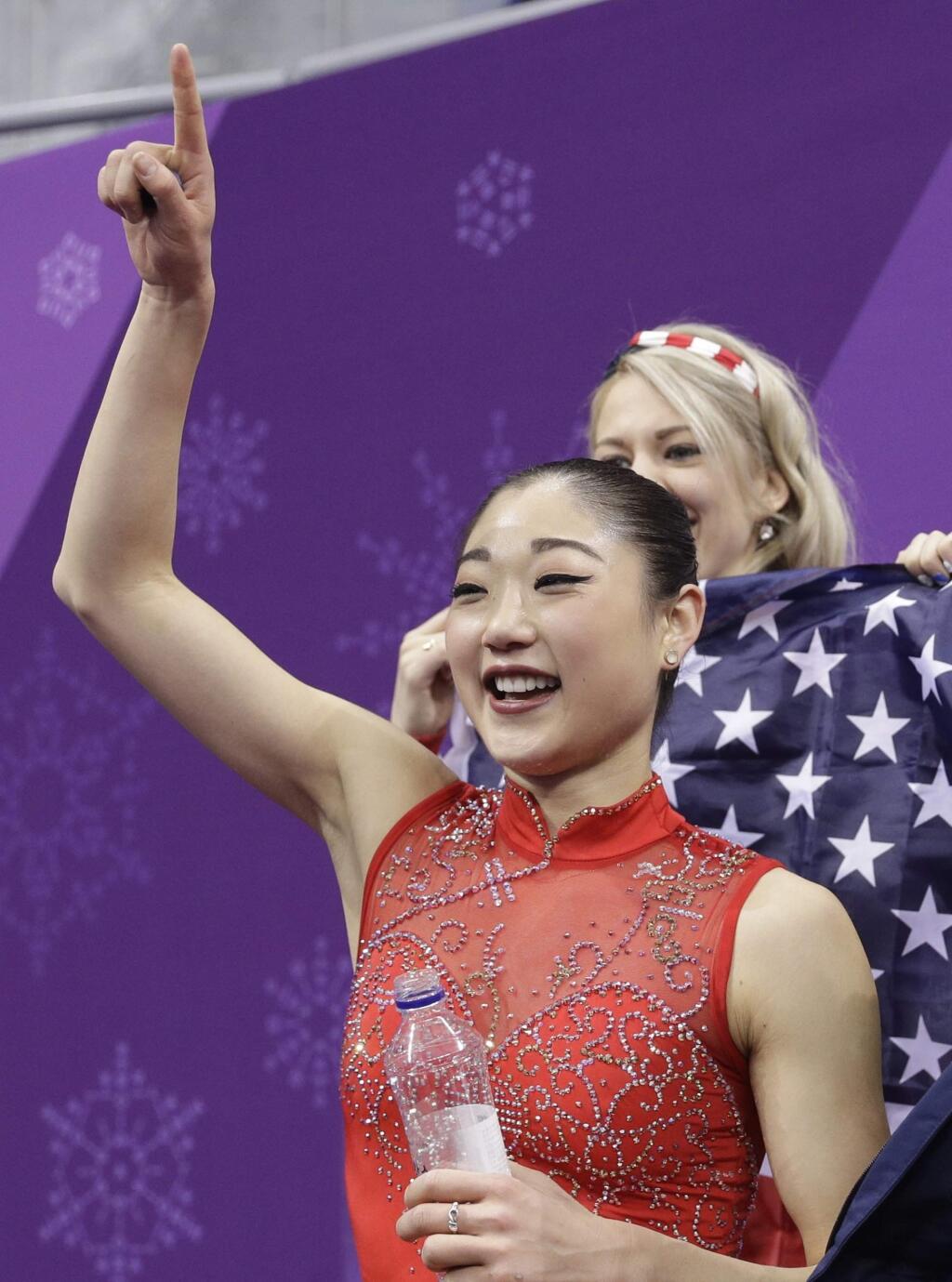 Mirai Nagasu of the United States reacts as she waits for her score in the ladies single skating free skating in the Gangneung Ice Arena at the 2018 Winter Olympics in Gangneung, South Korea, Monday, Feb. 12, 2018. (AP Photo/David J. Phillip)