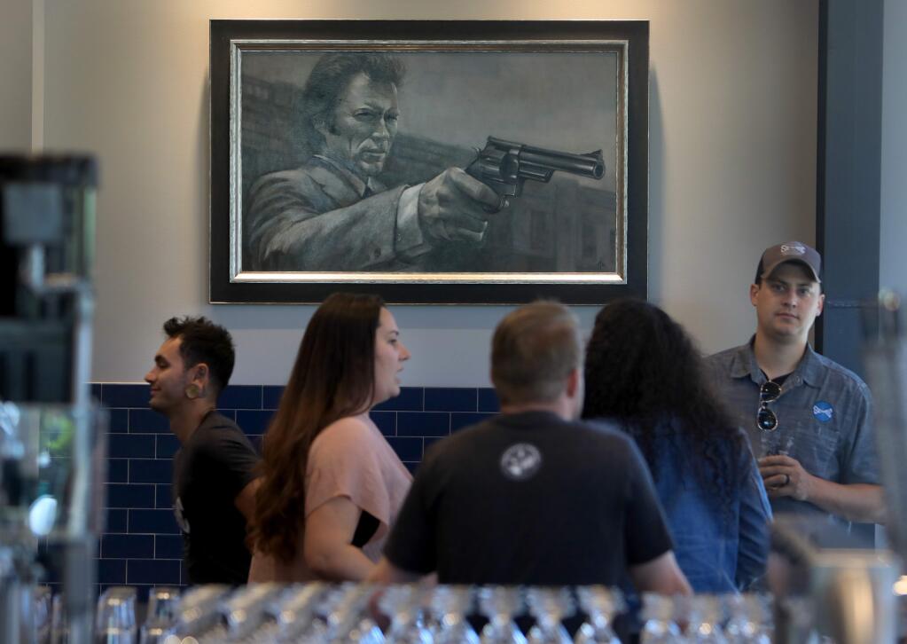 A portrait of Clint Eastwood's character Dirty Harry was painted by a friend of Seismic Brewing Co. owner Christopher Jackson, as part of homage to the Jackson family roots in San Francisco law enforcement. The brewery takes part in SF Beer Week. (Kent Porter / The Press Democrat)