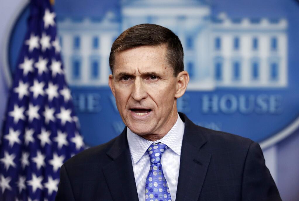 FILE - In this Feb. 1, 2017 file photo, then-National Security Adviser Michael Flynn speaks during the daily news briefing at the White House, in Washington. Flynn is detailing previously undisclosed paid speaking engagements, business positions and income from the presidential transition that he left off his public financial disclosure. A person close to Flynn tells The Associated Press that the filing shows Flynn entered into a consulting agreement with the British parent company of data firm Cambridge Analytica, which aided the Trump campaign. The person says Flynn didn‚Äôt perform work or accept payment under the agreement. He terminated it after Trump‚Äôs election victory. (AP Photo/Carolyn Kaster, File)
