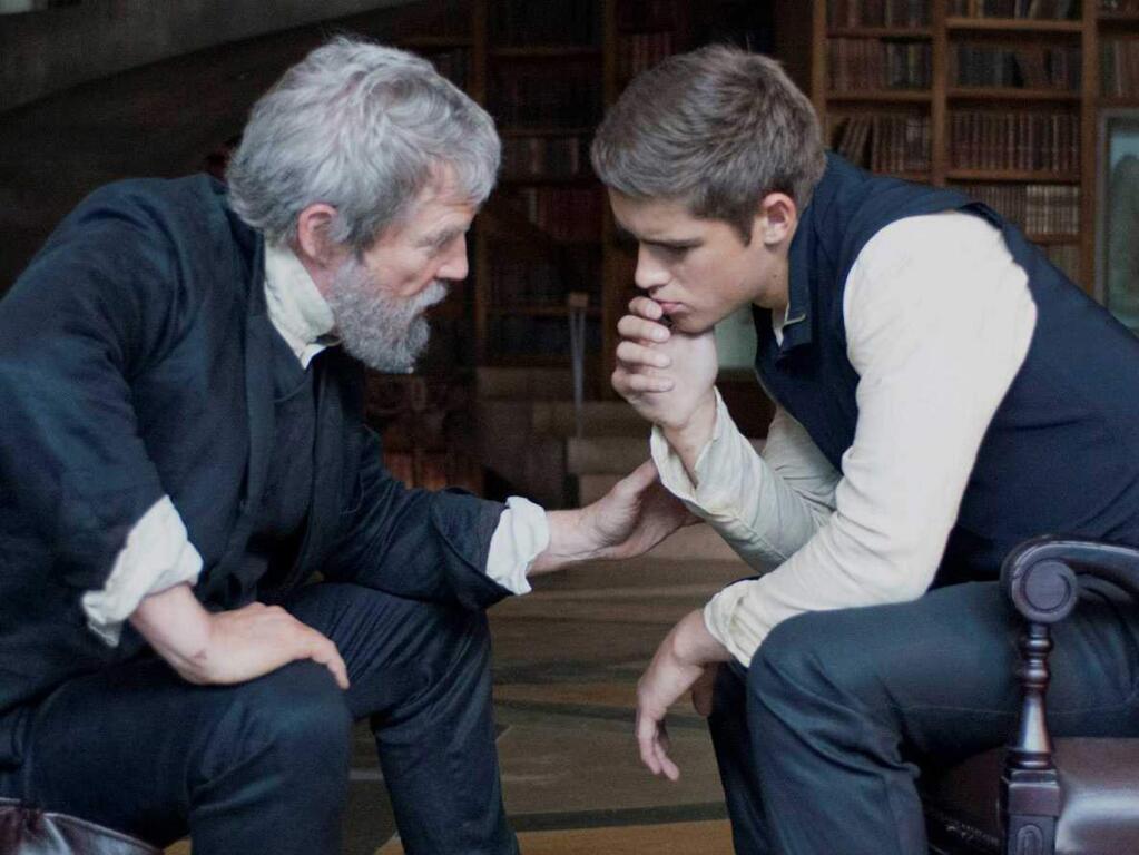 Weinstein Co.Brenton Thwaites, right, stars a Jonas and Jeff Bridges as The Giver in the adaptation of Lois Lowry's 1993 novel, 'The Giver.' The 16-year-old Jonas is selected to be the Receiver of Memory, but as Jonas uncovers the truth behind his world's past, he discovers that many years earlier, his forefathers gave up humanity in order to have a stable society.
