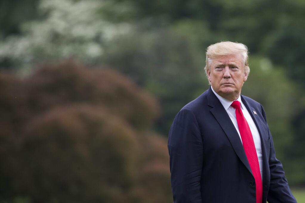 President Donald Trump walks to the Oval Office after arriving on Marine One on the South Lawn of the White House, Friday, May 17, 2019, in Washington. Trump is returning from a trip to New York. (AP Photo/Alex Brandon)