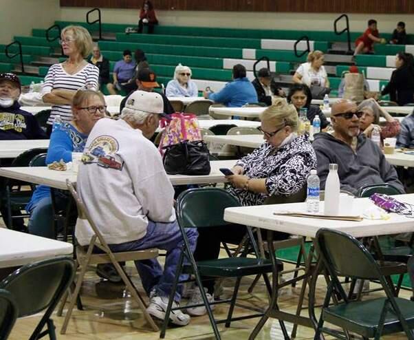 Sonoma residents wait out the Oct. 9 fire crisis in the gymnasium at Sonoma Valley High School. (Bill Hoban/Index-Tribune)