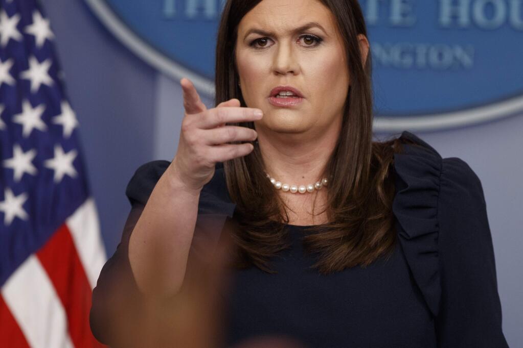 White House press secretary Sarah Huckabee Sanders calls on a reporter during the daily press briefing, Tuesday, Aug. 1, 2017, at the White House in Washington. (AP Photo/Evan Vucci)