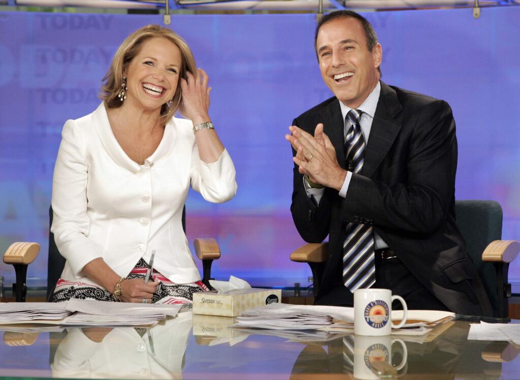 FILE - In this May 31, 2006 file photo, Katie Couric and Matt Lauer, co-hosts of the NBC Today' program, open her farewell broadcast in New York. Couric told People in a story published Saturday, Jan. 13, 2018: “I had no idea this was going on during my tenure or after I left.” She left NBC in 2006 to anchor the “CBS Evening News” and has been criticized for not speaking out in the more than a month since Lauer was fired. The show's network, NBC, said an investigation of a Lauer colleague's detailed complaint showed “inappropriate sexual behavior.” Since, other women have reportedly accused him of harassment and assault.(AP Photo/Richard Drew, File)