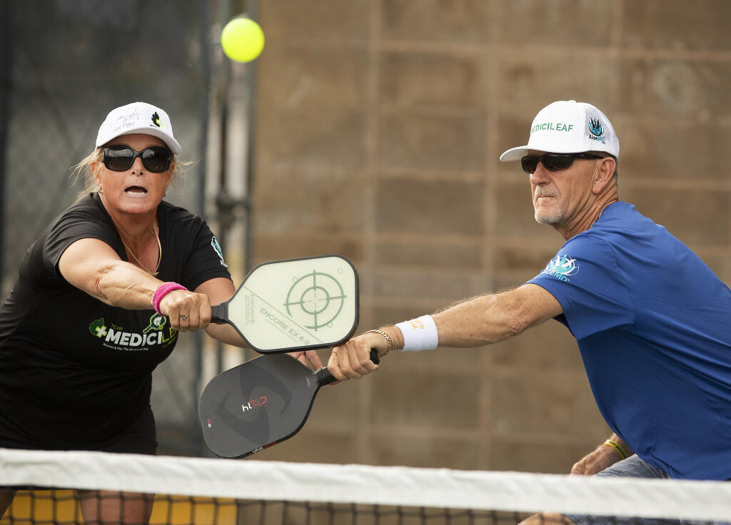Don Shaffer of Rincon Valley and his fiancee Cheryl Heller started the CBD company Medicileaf in 2015, but their products really took off when they became a sponsor of Professional Pickleball Association. The couple played at Howarth Park in Santa Rosa Wednesday, Aug. 17, 2022. (John Burgess/The Press Democrat)