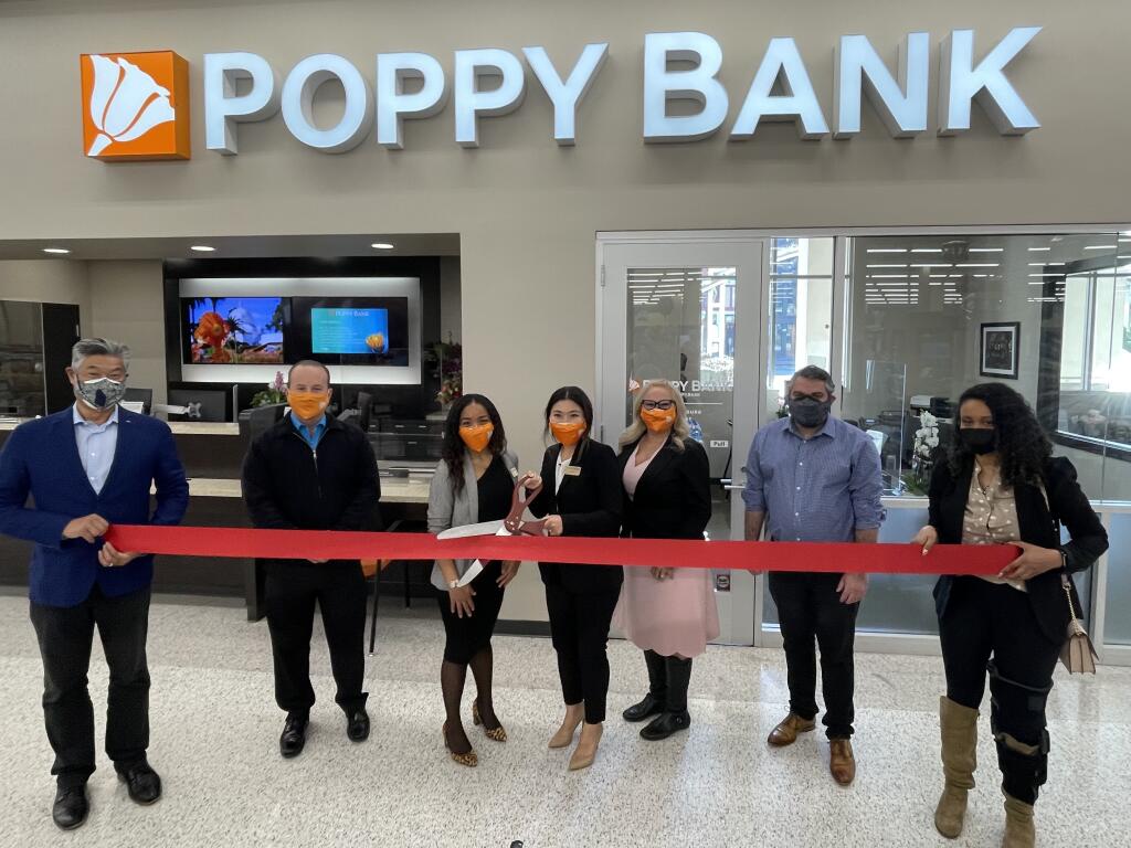 San Francisco Chamber of Commerce officials and bank executives turned out for the Jan. 12 ribbon cutting marking the grand opening of Poppy Bank in San Francisco. (courtesy of Poppy Bank)