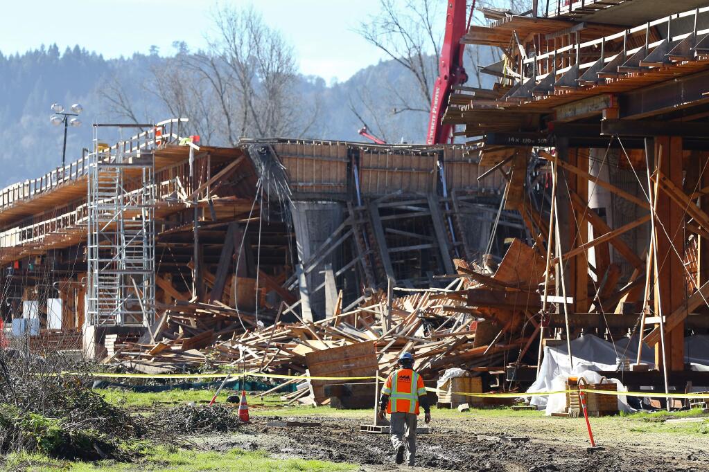 The collapsed span of the Willits bypass bridge in Willits on Friday, January 23, 2015. (Christopher Chung/ The Press Democrat)