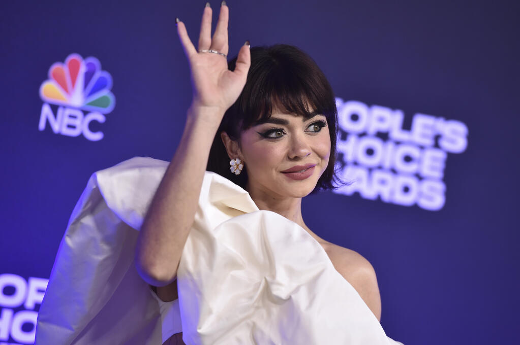 Sarah Hyland arrives at the People's Choice Awards on Tuesday, Dec. 7, 2021, at the Barker Hangar in Santa Monica, Calif. (Photo by Jordan Strauss/Invision/AP)