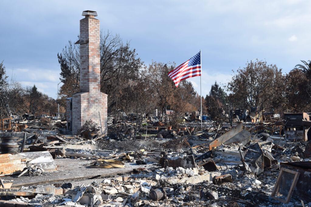 One of many scenes from a devastated Coffey Park in Santa Rosa. (Paul Gullixson / The Press Democrat)