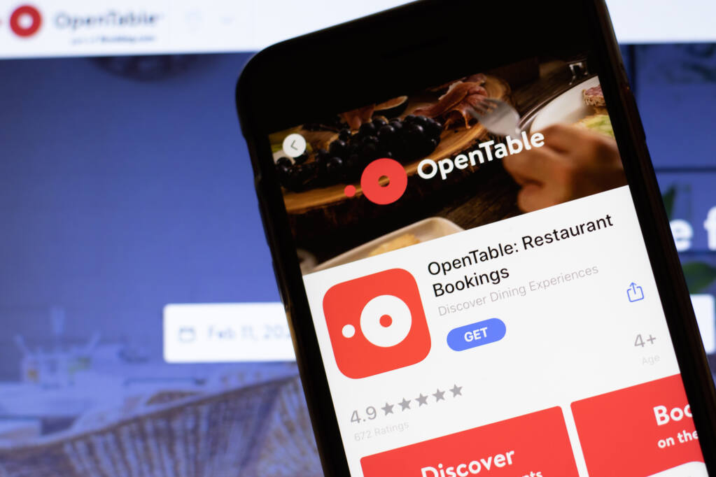 OpenTable now also allows restaurants to display COVID-19 vaccine requirements to diners. (Postmodern Studio / Shutterstock)