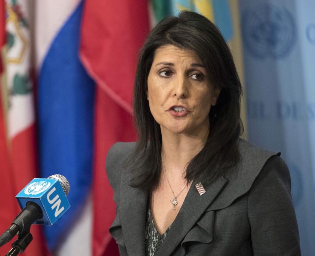 FILE - In this Jan. 2, 2018, file photo, United States Ambassador to the United Nations Nikki Haley speaks to reporters at United Nations headquarters. Haley says the U.S. is withdrawing from UN Human Rights Council, calling it 'not worthy of its name.' (AP Photo/Mary Altaffer, File)