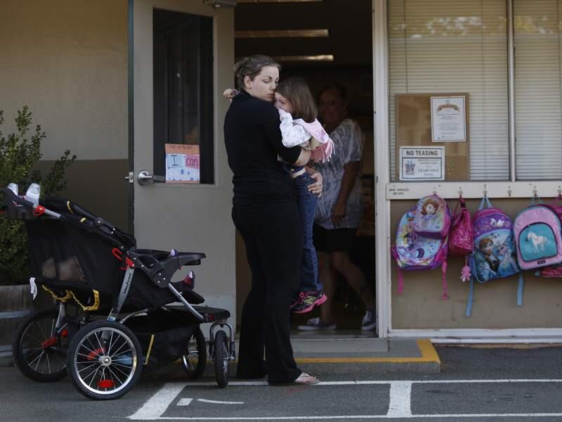 Meagan Currie drops off her daughter Madison at Browns Valley Elementary School in Napa on Wednesday, Aug. 27, 2014. (BETH SCHLANKER/ PD)