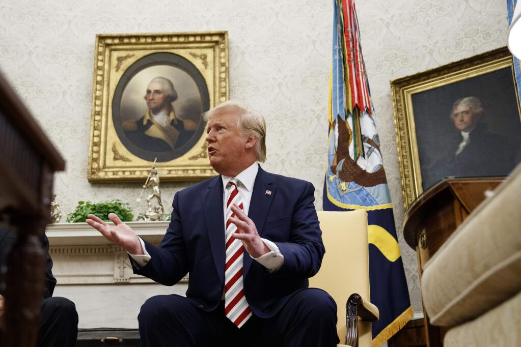 President Donald Trump speaks during a meeting with Romanian President Klaus Iohannis in the Oval Office of the White House, Tuesday, Aug. 20, 2019, in Washington. (AP Photo/Alex Brandon)