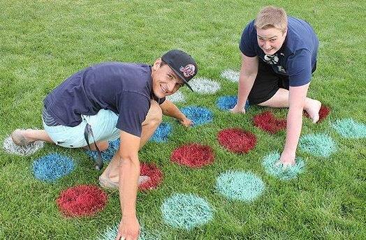 TWISTED: How about a backyard game of Twister with your siblings?
