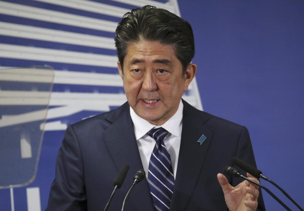Japan's Prime Minister Shinzo Abe speaks during a press conference at his Liberal Democratic Party headquarters in Tokyo, Monday, Oct. 23, 2017. Abe pledged to tackle what he called Japan's two national crises, the military threat from North Korea and an aging and shrinking population. (AP Photo/Koji Sasahara)