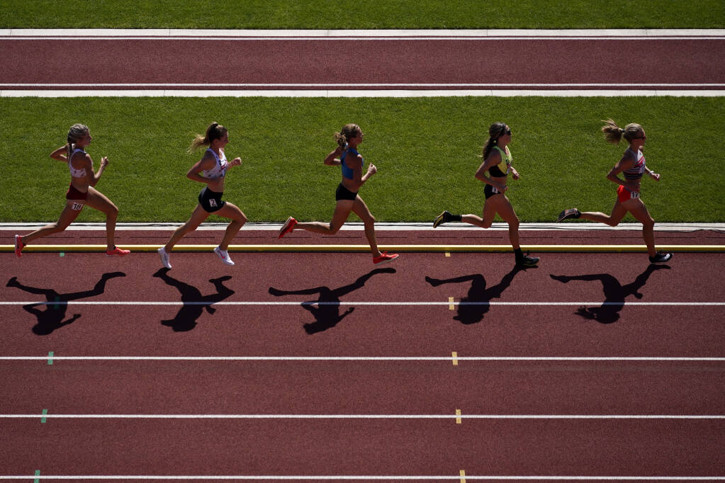 Montgomery High School graduate Sara Hall, center, and other runners compete in the women's 10,000-meter run at the U.S. Olympic Track and Field Trials pn Saturday, June 26, 2021, in Eugene, Oregon. (Ashley Landis / ASSOCIATED PRESS)