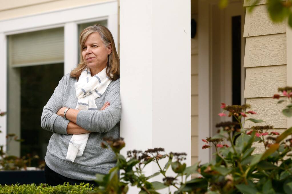 Kaiser Permanente surgeon Dr. Patricia May poses for a portrait outside a friend's home where she and her family have been staying after their home was destroyed by the Tubbs Fire, in Santa Rosa, California on Thursday, October 19, 2017. (Alvin Jornada / The Press Democrat)