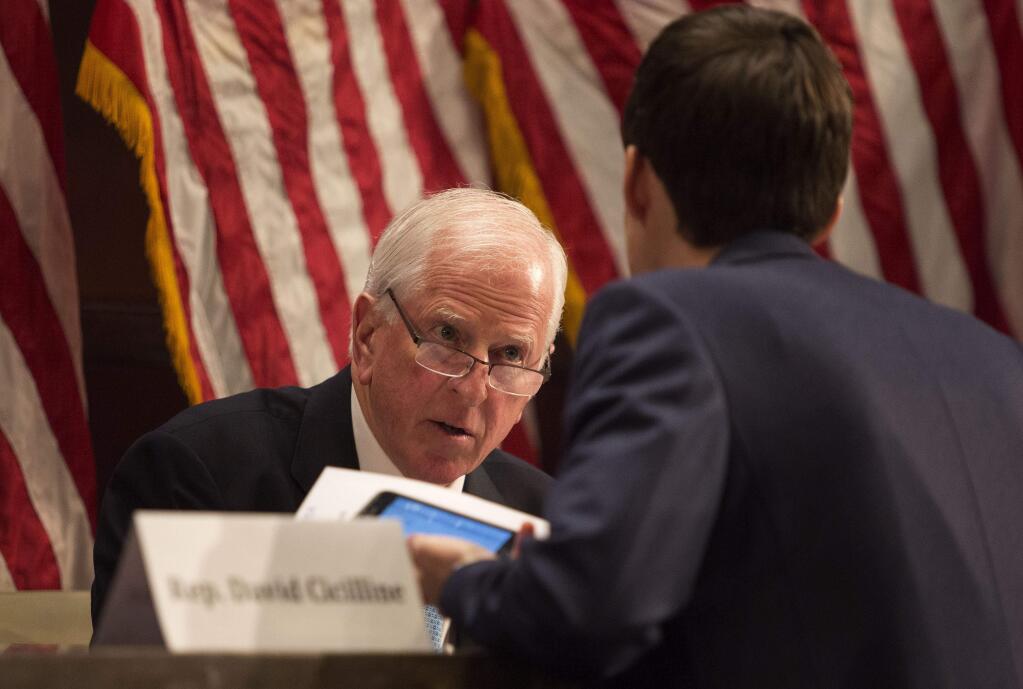 UNITED STATES - DECEMBER 8 - Rep. Mike Thompson, D-Calif., speaks to a hill staffer before a forum on common sense solutions to address gun violence on Capitol Hill in Washington, Tuesday, December 8, 2015. (Photo By Al Drago/CQ Roll Call) (CQ Roll Call via AP Images)
