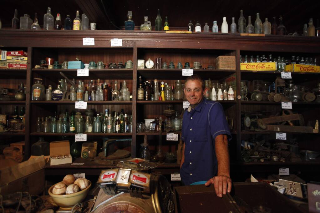Brian Witherell of Witherell's Auctioneers and Appraisals is running a big auction of all the contents of the old Pope Valley Store on Sept. 6. (Crista Jeremiason / The Press Democrat)