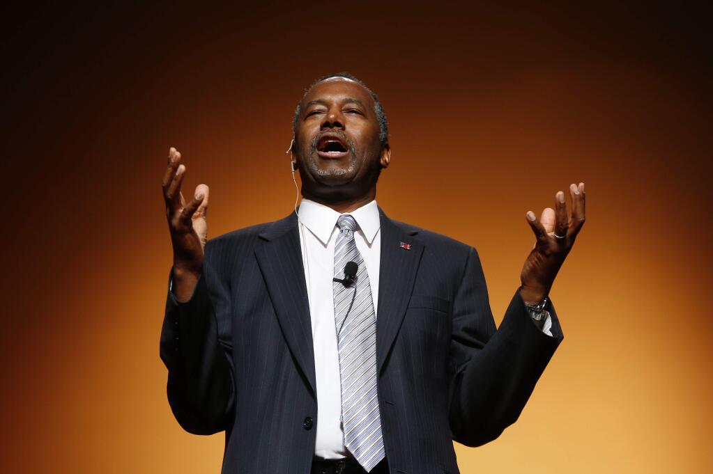 Ben Carson announces his candidacy for president during an official announcement in Detroit, Monday, May 4, 2015. Carson, 63, a retired neurosurgeon, begins the Republican primary as an underdog in a campaign expected to feature several seasoned politicians. (AP Photo/Paul Sancya)