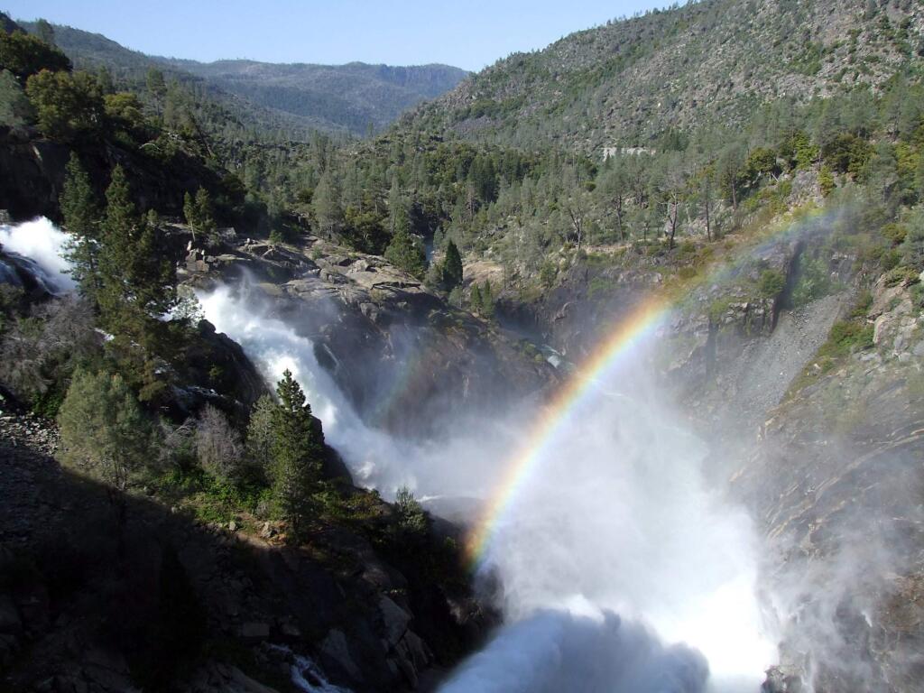 File - In this May 16, 2012 file photo, a rainbow forms in the mist from water releases at Hetch Hetchy Reservoir in Yosemite National Park, Calif. San Francisco's pristine tap water from mountain runoff in the Sierra Nevada may soon be a little less pure. City officials plan to mix groundwater into the supply, as they try to diversify and increase water reserves during the state's ongoing drought. The city is set to blend in groundwater starting in 2015 or 2016. San Francisco's water currently comes mostly from Sierra Nevada runoff stored in the Hetch Hetchy Reservoir. (AP Photo/The Modesto Bee, John Holland, File)