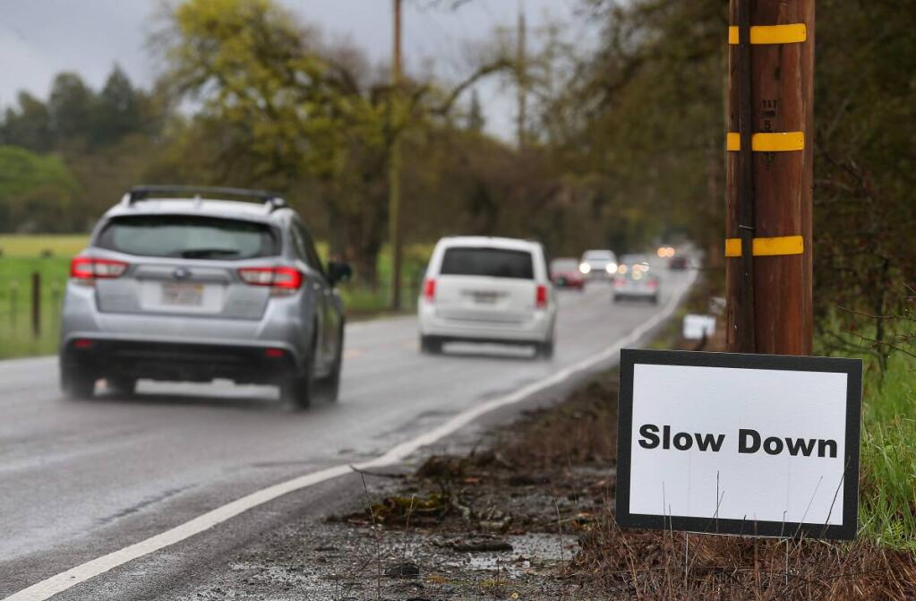Roadside signs from the county transportation department’s 2020 campaign encouraged county drivers to drive carefully.