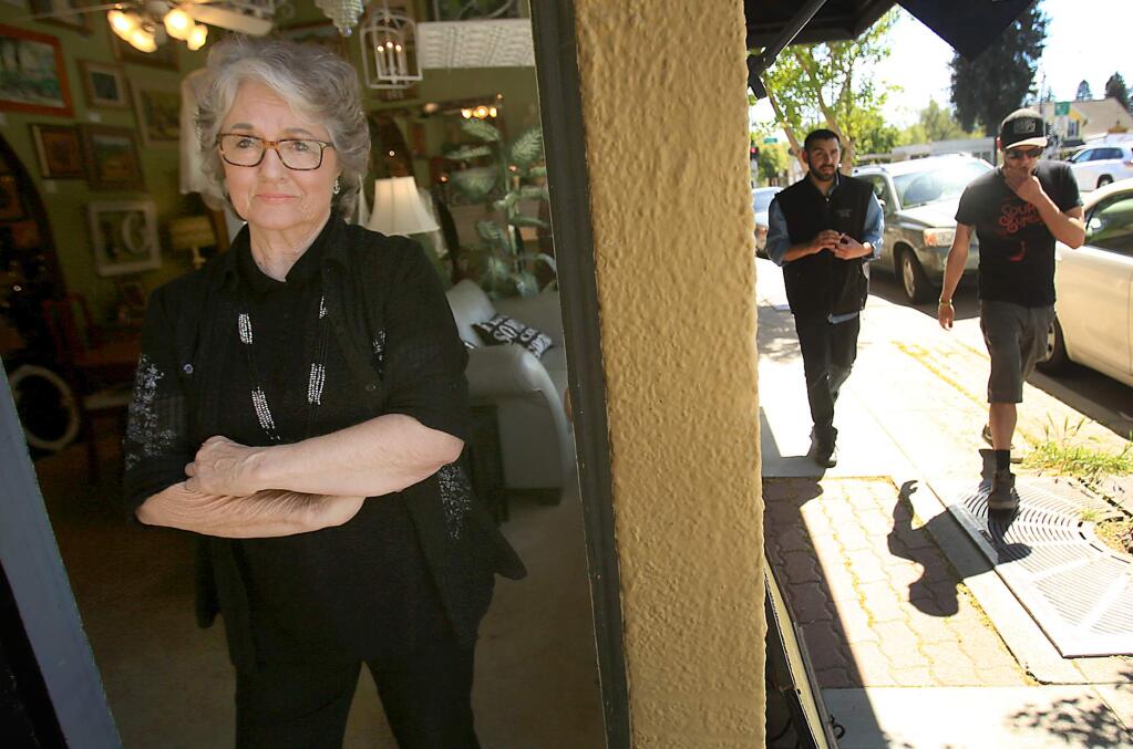 Janet Browning, owner of Shoffett's off the Square, an antique collective, worries the complete closure of Healdsburg Ave. at Mill Street for the construction of a roundabout will cripple her business and cut down on foot traffic, Tuesday April 5, 2016. (Kent Porter / Press Democrat) 2016