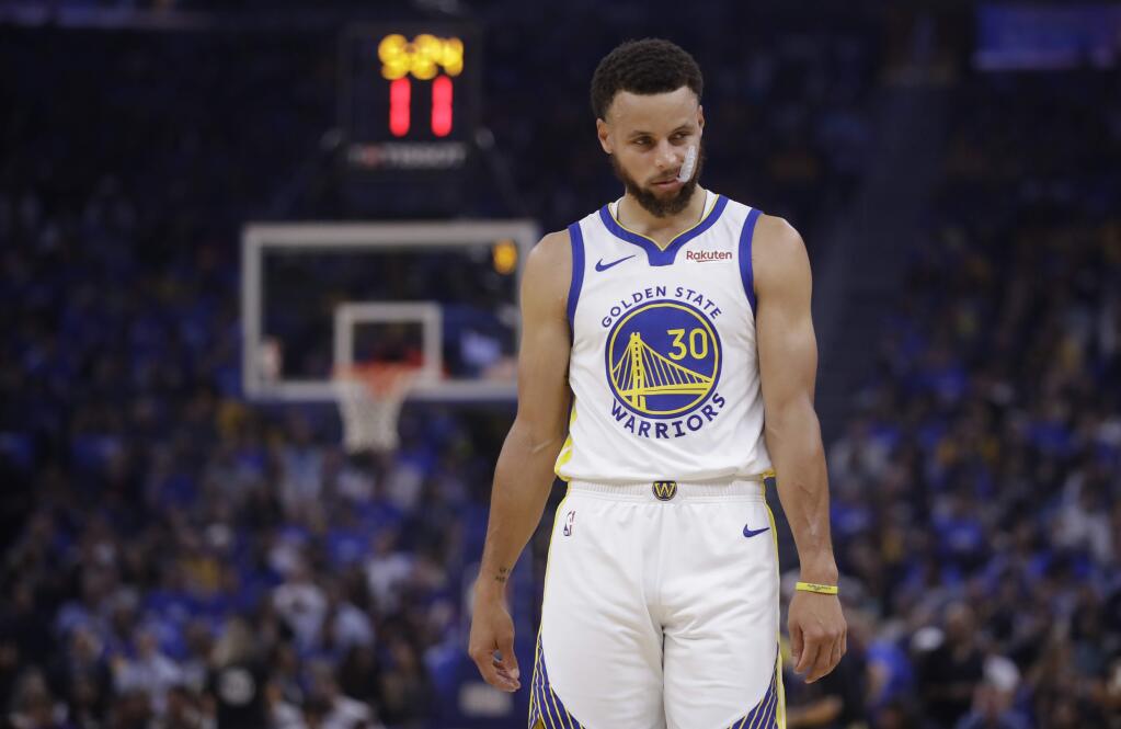 The Golden State Warriors' Stephen Curry walks on the court during the first half against the Los Angeles Clippers on Thursday, Oct. 24, 2019, in San Francisco. (AP Photo/Ben Margot)