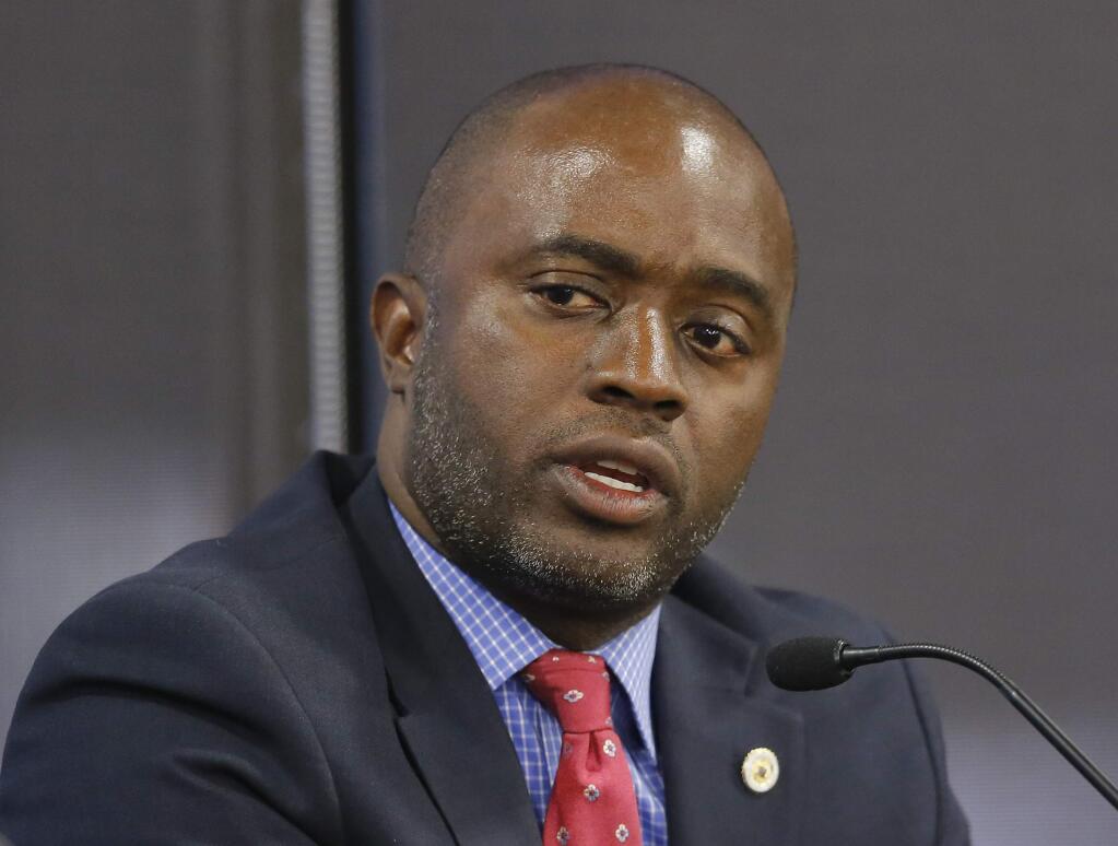 FILE -- In this Tuesday, Sept. 11, 2018 file photo ,Assemblyman Tony Thurmond, D-Richmond, a candidate for Superintendent of Public Instruction, appears at a candidates debate hosted by the Sacramento Press Club in Sacramento, Calif. Thurmond is running against Marshall Tuck, a former charter schools executive. California is again recording the most expense state superintendent election in history. (AP Photo/Rich Pedroncelli, file)