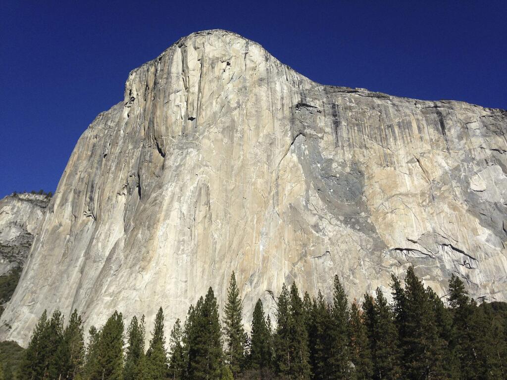 Shown is El Capitan where two climbers vying to become the first in the world to use only their hands and feet to scale a sheer slab of granite make their way to the summit Wednesday, Jan. 14, 2015, in Yosemite National Park, Calif. The pair are closing in on the top of the 3,000-foot (900-meter) peak and if all goes as planned, 30-year-old Kevin Jorgeson of California and 36-year-old Tommy Caldwell of Colorado, should complete their climb early Wednesday afternoon. (AP Photo/Ben Margot)