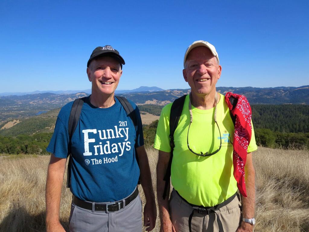 Bill Myers and David Chalk in 2018, leading one of the monthly hikes in and around Sonoma Valley. They're still waiting for their 20th anniversary hike and retirement party, canceled again. (Submitted)