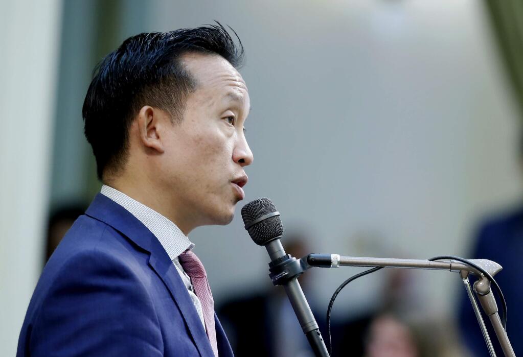 Assemblyman David Chiu, D-San Francisco, calls on lawmakers to approve his measure requiring school districts to update their records to reflect the chosen names and genders of graduates, during the Assembly session at the Capitol in Sacramento, Calif., Thursday, Aug. 15, 2019. The Assembly approved Chiu's measure and sent it to the governor. (AP Photo/Rich Pedroncelli)