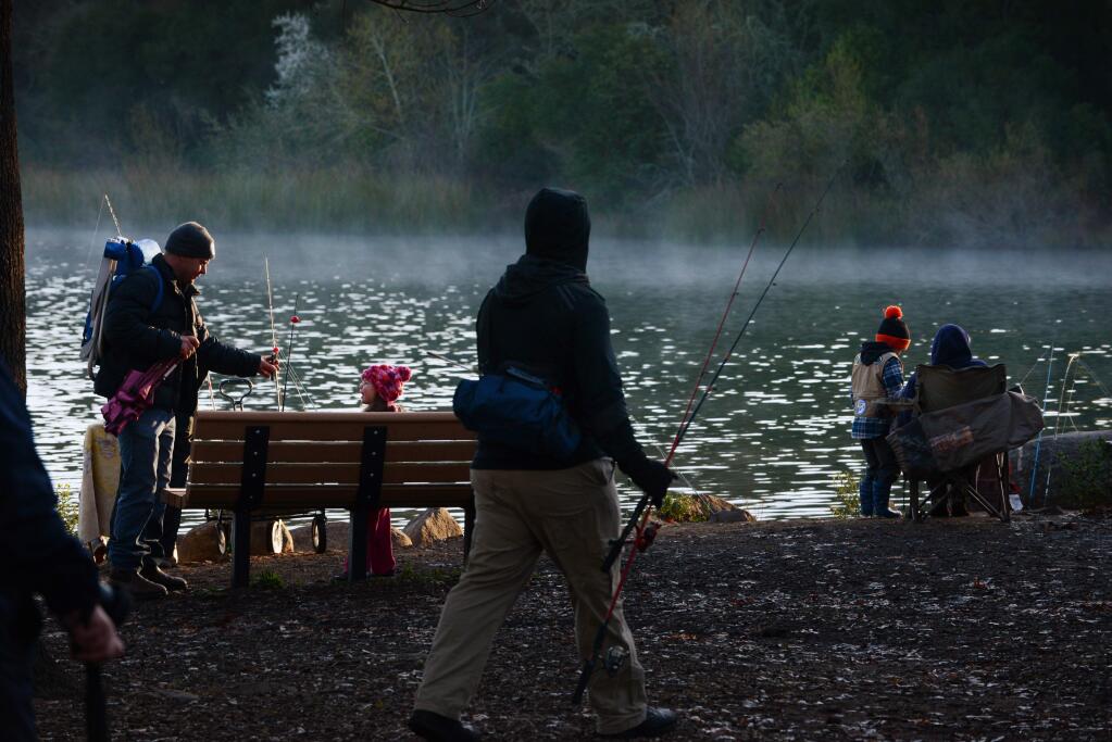 Early morning participants for Fishing Derby held Sunday at Lake Ralphine near Howarth Park in Santa Rosa, California. The $3 dollar event co-sponsored by the Santa Rosa Firefighters Association and Santa Rosa Recreation & Parks offered children 15 or under a chance to fish with a parent or guardian from 7:30-10:30am. February 26, 2017. (Photo: Erik Castro/for The Press Democrat)