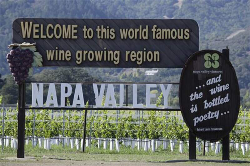 In this photo taken Oct. 27, 2011, a sign along Highway 29 welcomes visitors to the Napa Valley in Oakville, Calif. (AP Photo/Eric Risberg)