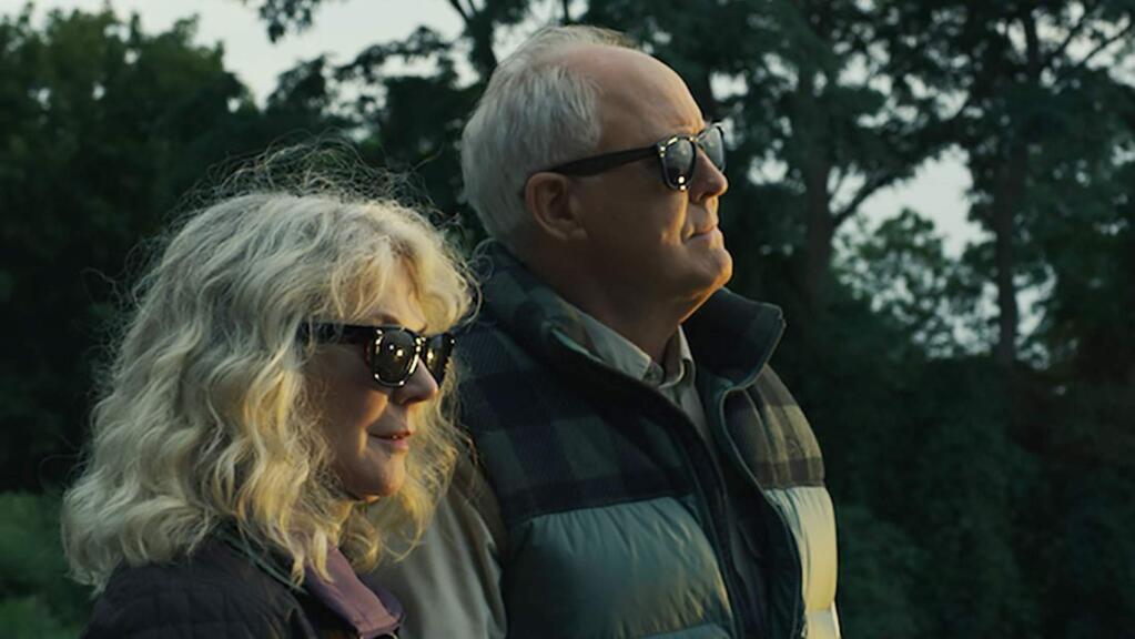 Blythe Danner and John Lithgow play a hoarder and a prepper try to find love while trying not to get lost in each other's stuff in 'The Tomorrow Man.' (Bleecker Street)