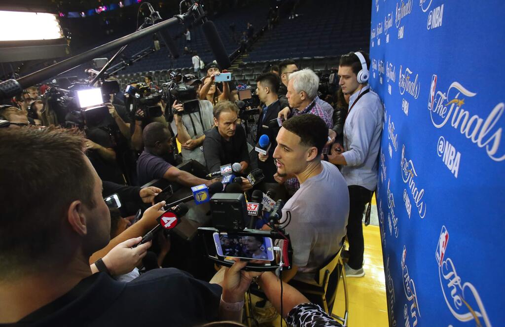 Golden State Warriors guard Klay Thompson answers questions from the media, in Oakland on Wednesday, May 31, 2017. (Christopher Chung/ The Press Democrat)