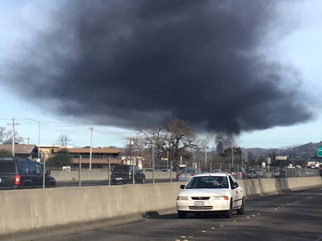 A large truck driving on Fountaingrove Parkway slammed into multiple vehicles, catching fire and sending a huge plume of dark smoke over the northern end of Santa Rosa on Monday, Feb. 5, 2018. (CHRIS SMITH/ PD)