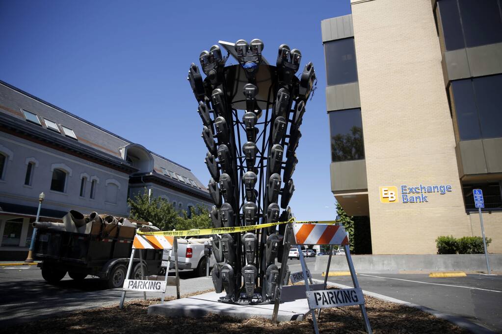 The newly installed sculpture on 5th Street in Santa Rosa is constructed of parking meters. Photo taken on Monday, July 16, 2018. (BETH SCHLANKER/ PD)
